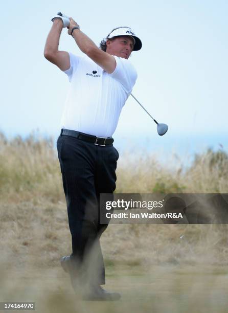 Phil Mickelson of the United States tees off on the fifth hole during the final round of the 142nd Open Championship at Muirfield on July 21, 2013 in...