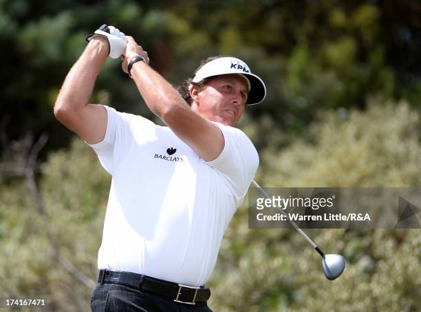 Phil Mickelson of the United States tees off on the third hole during the final round of the 142nd Open Championship at Muirfield on July 21, 2013 in...