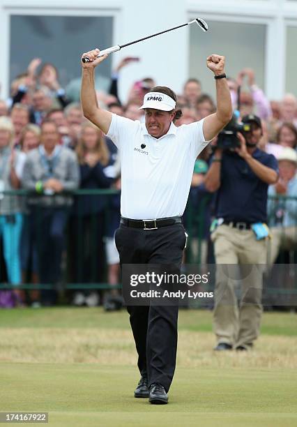 Phil Mickelson of the United States reacts to a birdie putt on the 18th hole during the final round of the 142nd Open Championship at Muirfield on...