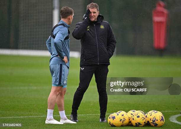 Newcastle United's English head coach Eddie Howe takes a training session at the team's training facility in Newcastle-upon-Tyne, northeast England,...