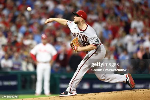 Merrill Kelly of the Arizona Diamondbacks throws a first inning pitch against the Philadelphia Phillies during Game Two of the Championship Series at...