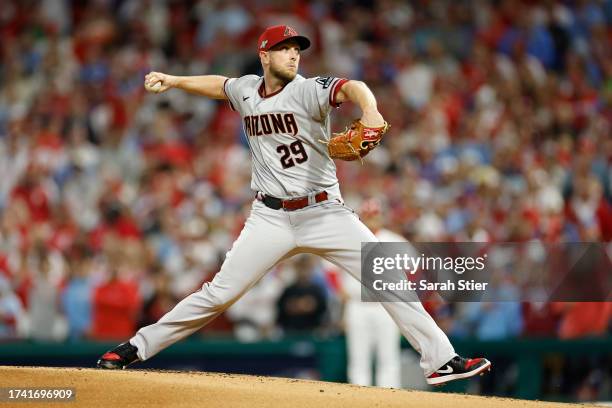 Merrill Kelly of the Arizona Diamondbacks throws a first inning pitch against the Philadelphia Phillies during Game Two of the Championship Series at...