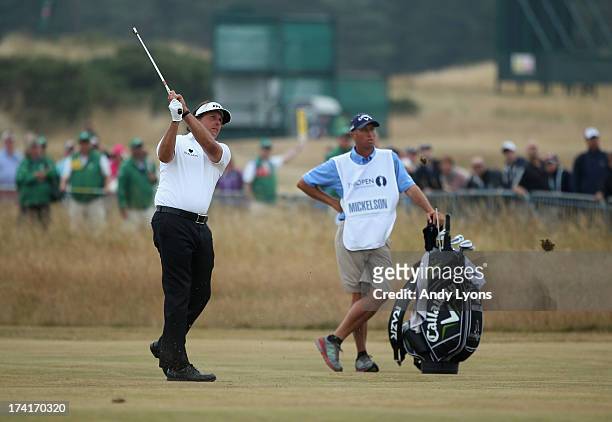 Phil Mickelson of the United States hits a shot on the 18th during the final round of the 142nd Open Championship at Muirfield on July 21, 2013 in...