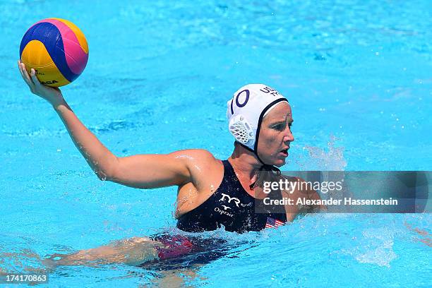 Kelly Rulon of USA looks to make a pass during the Women's Water Polo first preliminary round match between USA and Greece during Day Two of the 15th...