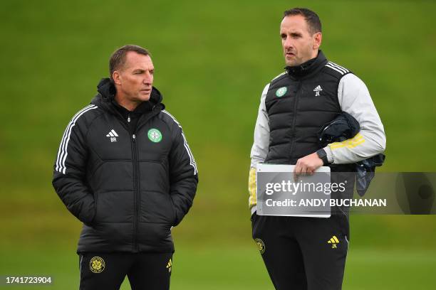 Celtic's Northern Ireland coach Brendan Rodgers and assistant John Kennedy attend a team training session at the Celtic Training Centre in...