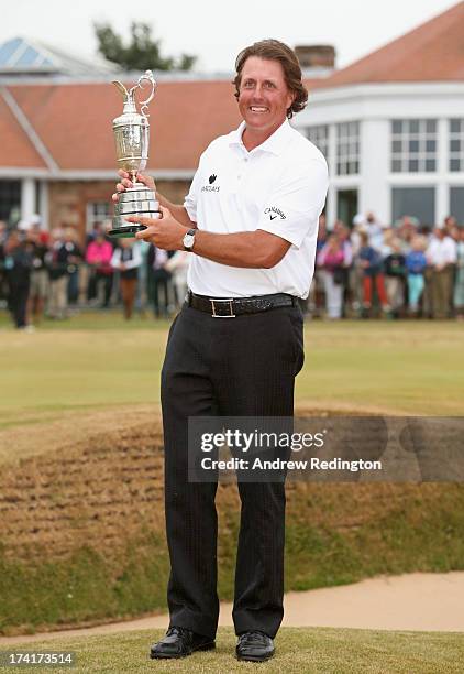 Phil Mickelson of the United States holds the Claret Jug after winning the 142nd Open Championship at Muirfield on July 21, 2013 in Gullane, Scotland.