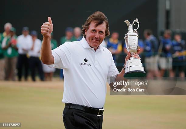 Phil Mickelson of the United States holds the Claret Jug after winning the 142nd Open Championship at Muirfield on July 21, 2013 in Gullane, Scotland.