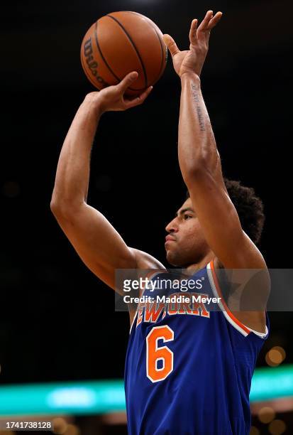 Quentin Grimes of the New York Knicks shoots the ball during the second quarter of the Celtic's preseason game against the New York Knicks at TD...