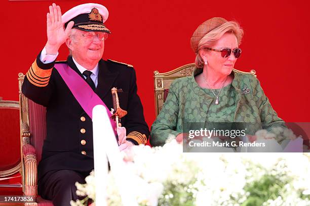 King Albert II of Belgium and Queen Paola of Belgium seen during the Civil and Military Parade during the Abdication Of King Albert II Of Belgium, &...