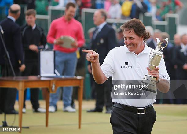 Phil Mickelson of the United States holds the Claret Jug after winning the 142nd Open Championship at Muirfield on July 21, 2013 in Gullane, Scotland.