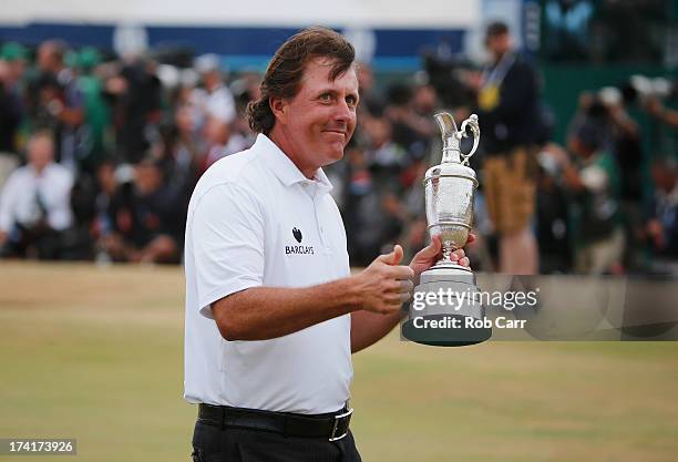 Phil Mickelson of the United States holds the Claret Jug after winning the 142nd Open Championship at Muirfield on July 21, 2013 in Gullane, Scotland.