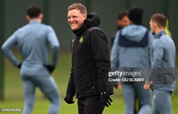 Newcastle United's English head coach Eddie Howe attends a training session at the team's training facility in Newcastle-upon-Tyne, northeast...