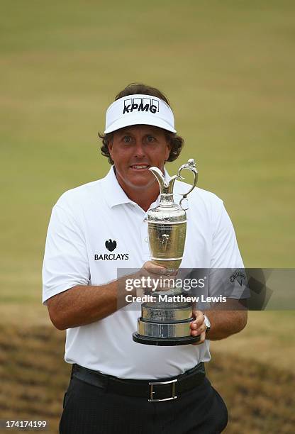 Phil Mickelson of the United States holds the Claret Jug after winning the 142nd Open Championship at Muirfield on July 21, 2013 in Gullane, Scotland.