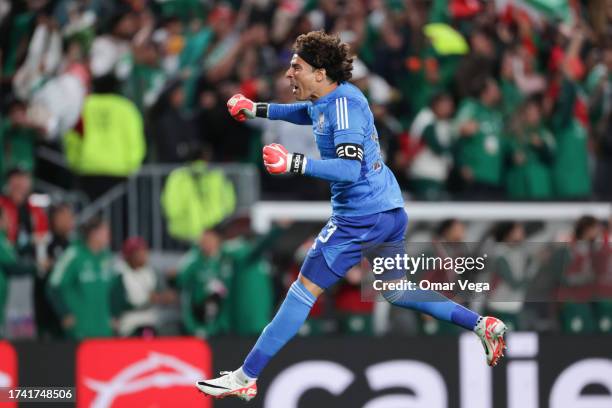 Goalkeeper Guillermo Ochoa of Mexico celebrates his teammate Uriel Antuna's goal during the international friendly between Germany and Mexico at...