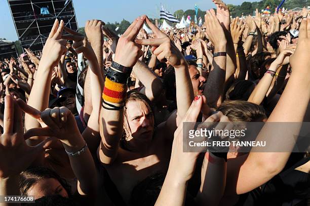 Public cheers British band Alt-J on July 21, 2013 at the Vieilles Charrues music Festival in Carhaix-Plouguer, western of France. AFP PHOTO FRED...
