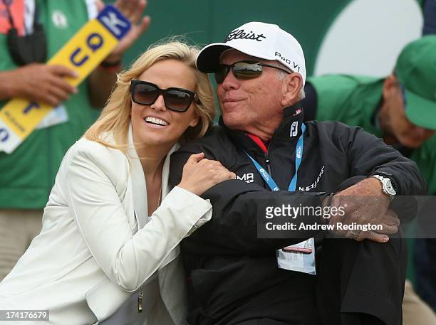 Amy Mickelson, wife of Phil Mickelson, celebrates with coach Butch Harmon during the 142nd Open Championship at Muirfield on July 21, 2013 in...