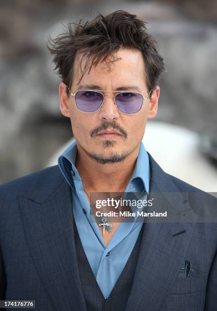 Johnny Depp attends the UK Premiere of 'The Lone Ranger' at Odeon Leicester Square on July 21, 2013 in London, England.