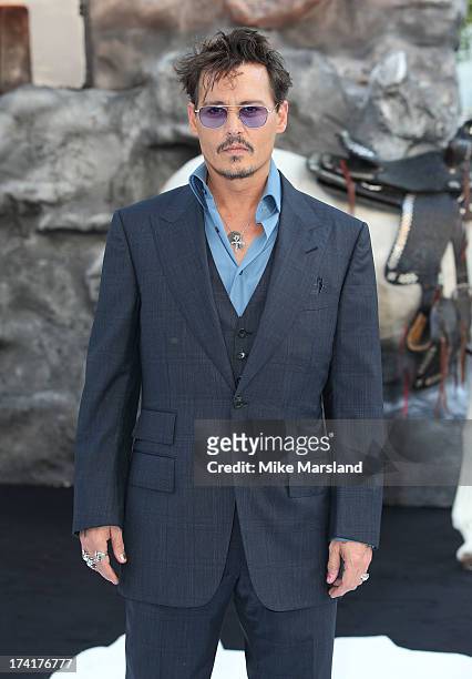 Johnny Depp attends the UK Premiere of 'The Lone Ranger' at Odeon Leicester Square on July 21, 2013 in London, England.