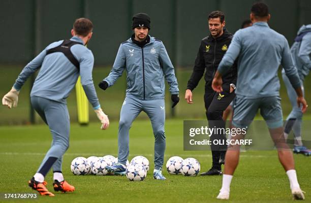 Newcastle United's Brazilian midfielder Bruno Guimaraes attends a training session at the team's training facility in Newcastle-upon-Tyne, northeast...