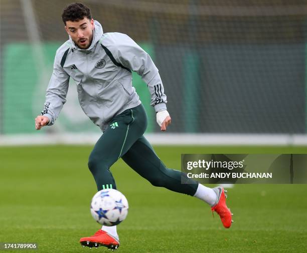 Celtic's Irish striker Michael Johnston attends a team training session at the Celtic Training Centre in Lennoxtown, north of Glasgow on October 24...