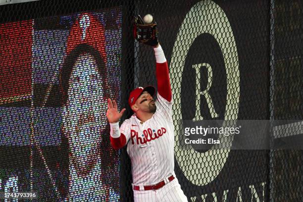 Nick Castellanos of the Philadelphia Phillies makes a fifth inning catch while playing the Arizona Diamondbacks during Game Two of the Championship...