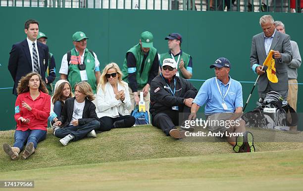 Family of Phil Mickelson, children Sophia, Evan and Amanda, wife Amy, coach Butch Harmon, caddie Jim Mackay and former coach Steve Loy sit by the...