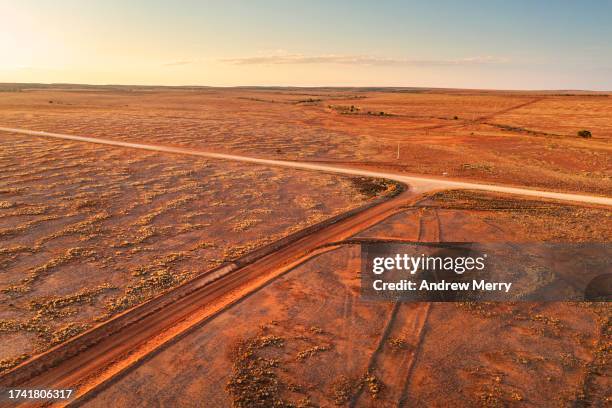 dirt road intersection outback landscape - sturt national park stock pictures, royalty-free photos & images