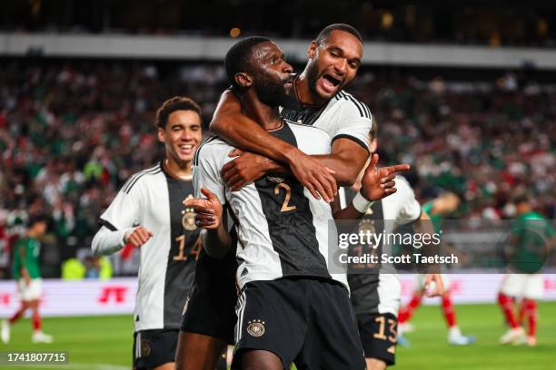 Antonio Rüdiger of Germany celebrates with teammates after scoring a goal against Mexico during the first half of the international friendly at...