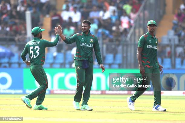 Bangladesh's captain Shakib Al Hasan celebrates the wicket of Aiden Markram of South Africa during the ICC Men's Cricket World Cup 2023 match between...
