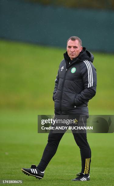 Celtic's Northern Ireland coach Brendan Rodgers attends a team training session at the Celtic Training Centre in Lennoxtown, north of Glasgow on...