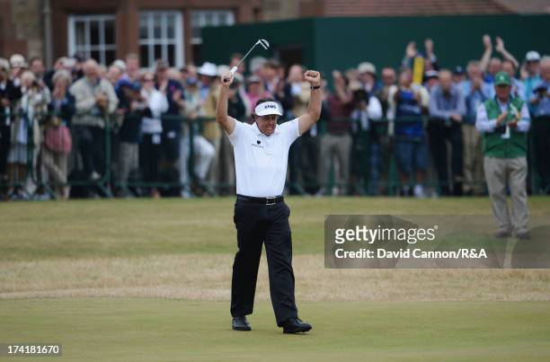 Phil Mickelson of the United States celebrates holing a birdie putt on the 18th green during the final round of the 142nd Open Championship at...