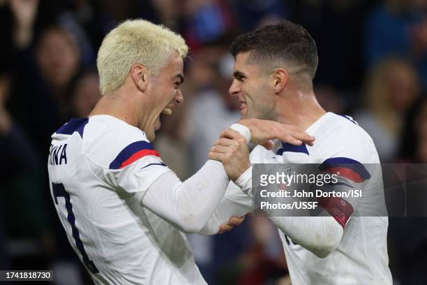 Gio Reyna of the United States celebrates scoring with Christian Pulisic during the first half against Ghana during an international friendly at...