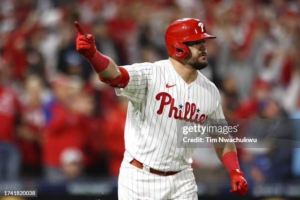 Kyle Schwarber of the Philadelphia Phillies reacts after his sixth inning solo home run against the Arizona Diamondbacks during Game Two of the...