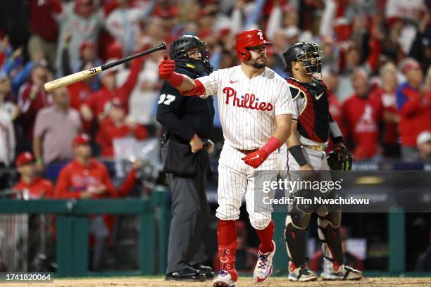 Kyle Schwarber of the Philadelphia Phillies reacts after his sixth inning solo home run against the Arizona Diamondbacks during Game Two of the...