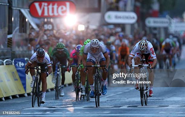 Marcel Kittel of Germany and Team Argos-Shimano wins the sprint during the twenty first and final stage of the 2013 Tour de France, a processional...