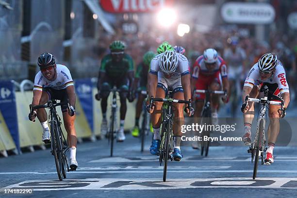 Marcel Kittel of Germany and Team Argos-Shimano beats Mark Cavendish of Omega Pharma-Quickstep and Andre Greipel of Lotto Belisol in the sprint...