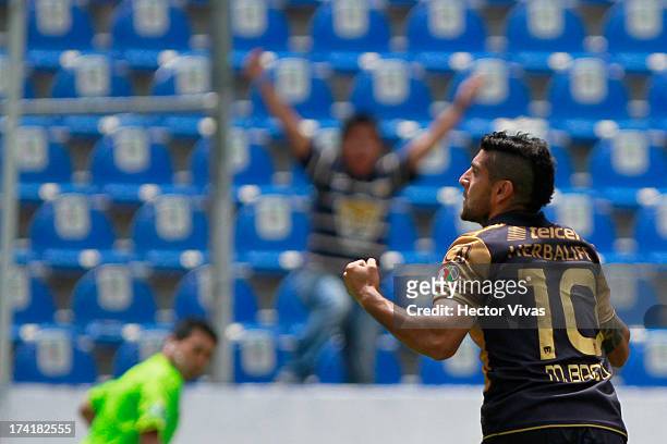 Omar Bravo of Pumas celebrates a goal against Puebla during a match between Pumas and Puebla as part of the Torneo Apertura 2013 Liga Mx at...