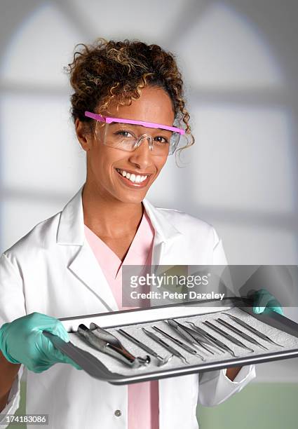 dentist / dental hygienist - surgical tray stock pictures, royalty-free photos & images