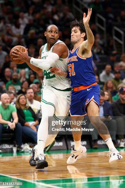 Al Horford of the Boston Celtics drives to the basket against Ryan Arcidiacono of the New York Knicks during the second half of the Celtic's...