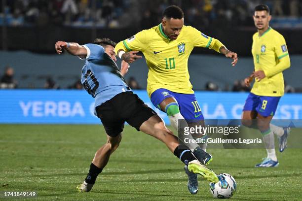 Manuel Ugarte of Uruguay competes for the ball with Neymar Jr. Of Brazil during the FIFA World Cup 2026 Qualifier match between Uruguay and Brazil at...
