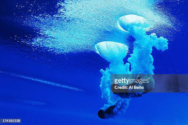 Yuan Cao and Yanguan Zhang of China compete in the Men's 10m Platform Synchronised Diving final on day two of the 15th FINA World Championships at...