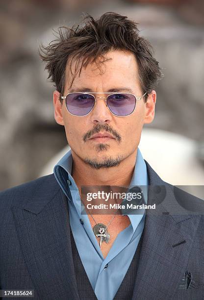 Johnny Depp attends the UK Premiere of 'The Lone Ranger' at Odeon Leicester Square on July 21, 2013 in London, England.