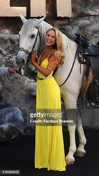Kimberley Garner attends the UK Premiere of 'The Lone Ranger' at Odeon Leicester Square on July 21, 2013 in London, England.