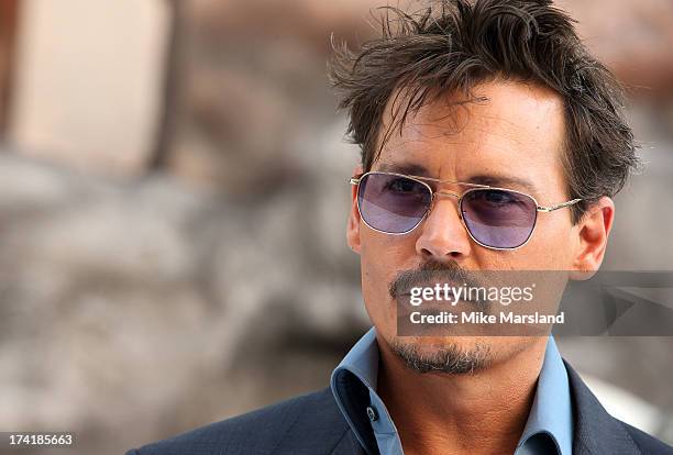 Johnny Depp attends the UK Premiere of 'The Lone Ranger' at Odeon Leicester Square on July 21, 2013 in London, England.