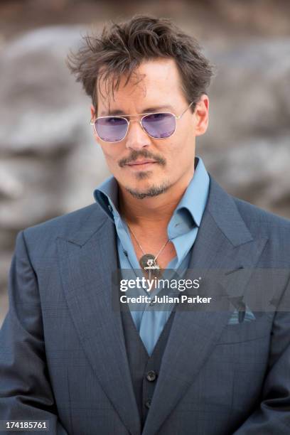 Johnny Depp attends the UK Premiere of 'The Lone Ranger' at Odeon Leicester Square on July 21, 2013 in London, England.