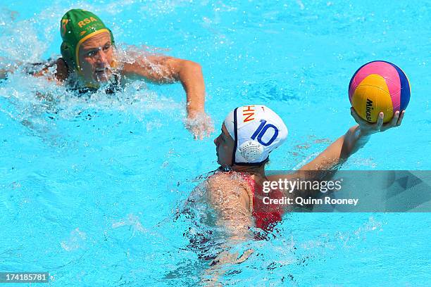 Ma Huanhuan of China passes the ball during the Women's Water Polo first preliminary round match between China and South Africa during Day Two of the...