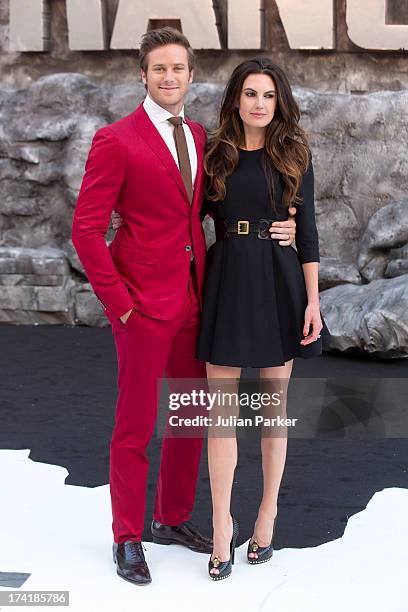 Armie Hammer and wife Elizabeth Chambers attend the UK Premiere of 'The Lone Ranger' at Odeon Leicester Square on July 21, 2013 in London, England.