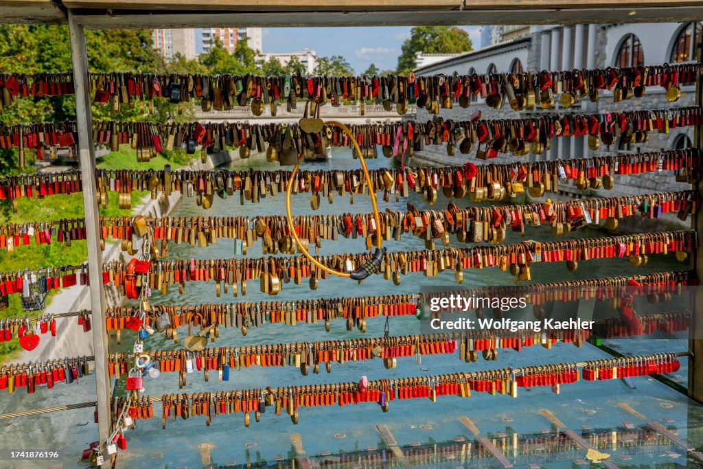 Lovers have symbolically padlocked their love on the...