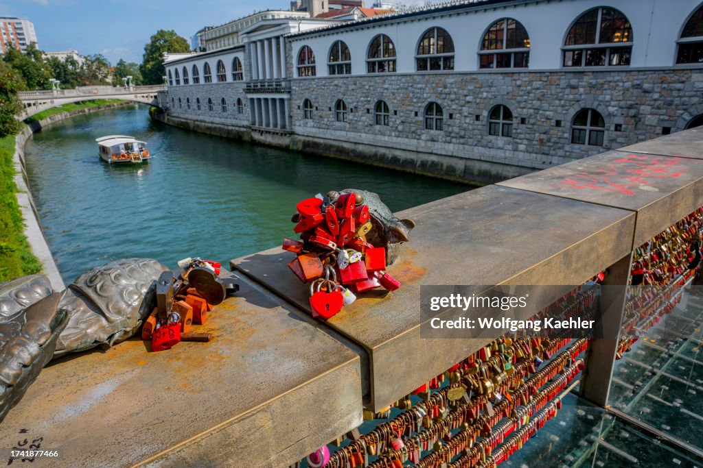Lovers have symbolically padlocked their love on the...