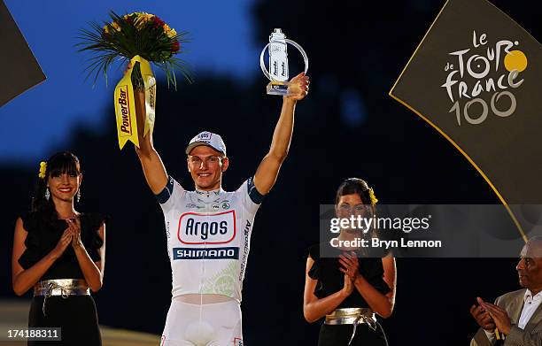 Stage Winner Marcel Kittel of Germany and Team Argos-Shimano celebrates on the podium after the twenty first and final stage of the 2013 Tour de...